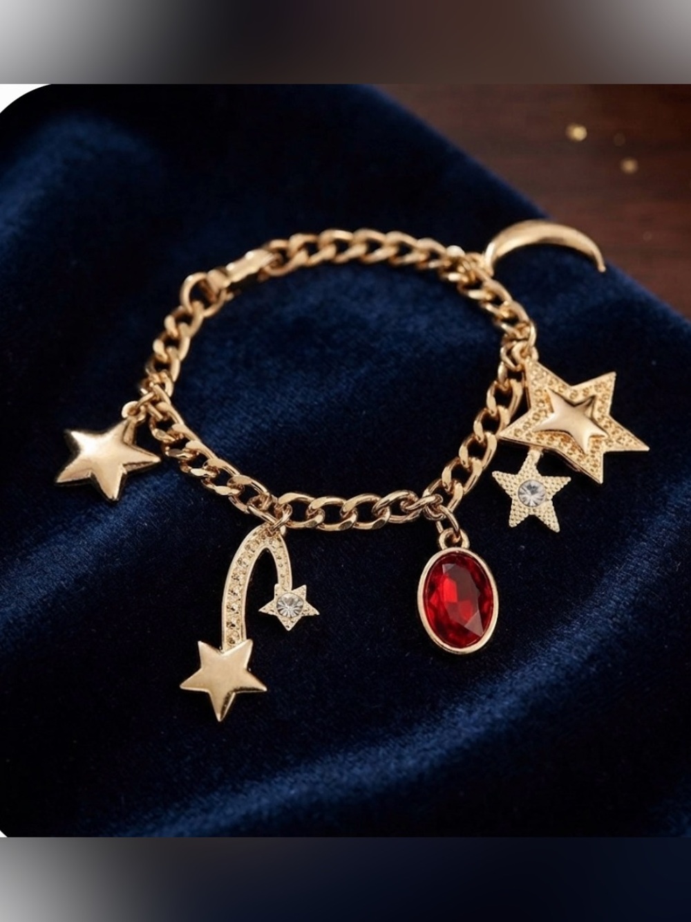 Goldstone  Star and Moon Charm Bracelet. Sz6